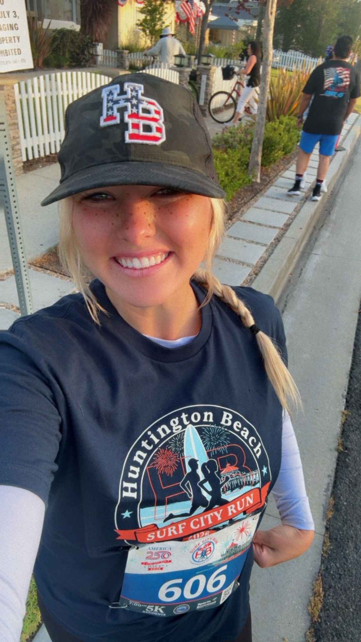 Elyssa in a Huntington Beach cap and Surf City Run shirt on race morning, July 4th