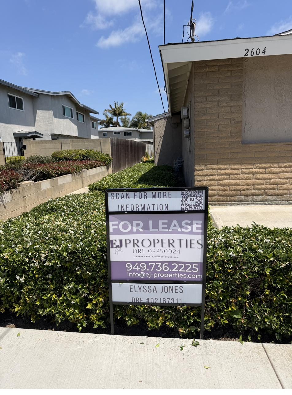 EJ Properties for lease sign in front of a Huntington Beach property
